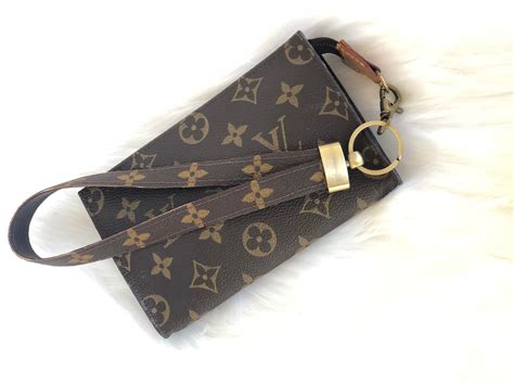 louis vuitton pouch with wrist strap|louis vuitton canvas strap.